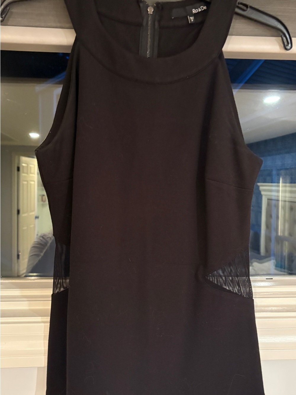 Black Sleeveless top with Subtle Sheer Insets